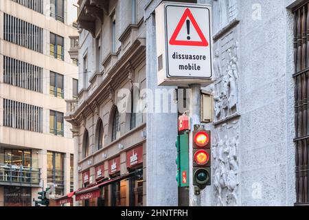 traffic light prohibiting the passage of pedestrians in the street Stock Photo