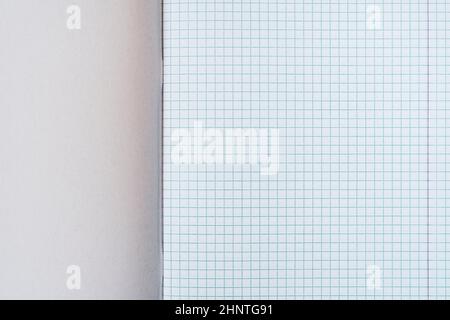 Open squared school notebook, close up view. Copy-space. Stock Photo