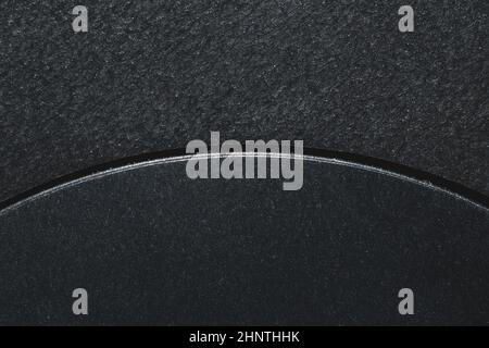 Black background with a curved slit. plastic texture macro Stock Photo