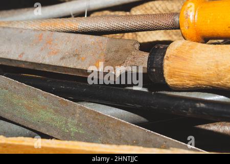 Pile of the old rasps. different carpentry files. various graters. instrument for wood processing. hand tools Stock Photo