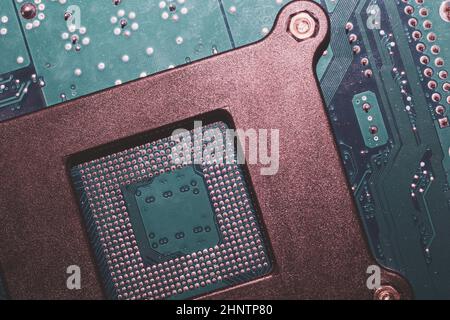 Processor pins macro. computer motherboard close up. cpu pins on a circuit board. micro elements of computer central processor unit. modern technologi Stock Photo