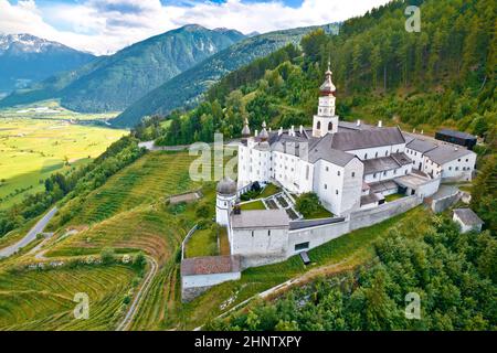 Abbey of Monte Maria in Alpine village of Burgeis view, Trentino Alto Adige region of Italy Stock Photo