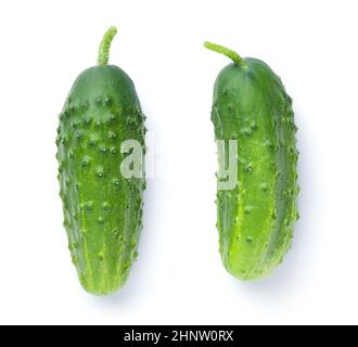 Two fresh green cucumbers isolated on white background. Top view Stock Photo