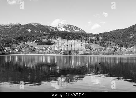Beautiful reflection of mountain village in Hallstatter See, Austria, Europe Stock Photo