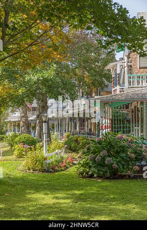 Carpenter Gothic Cottages with Victorian style, gingerbread trim on Lake Avenue, Oak Bluffs on Martha's Vineyard, Massachusetts, USA. Stock Photo