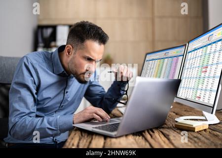 Spreadsheet Business Audit And Fraud Investigation On Computer Stock Photo