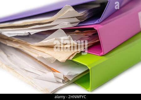 File Folder Binder stack of multi color on table in office. Stock Photo
