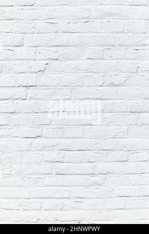 old white brick wall painted in white as harmonic background Stock Photo