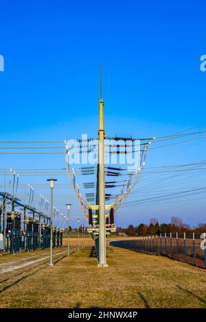 hight voltage tower in rural landscape with blue sky Stock Photo - Alamy