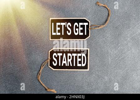 Text sign showing Let S Get Started, Concept meaning encouraging someone to begin doing something Collection of Blank Empty Sticker Tags Tied With A S Stock Photo
