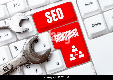 Text sign showing Seo Monitoring, Internet Concept Tracking the progress of strategy made in the platform Abstract Presenting Ethical Hacker, Typing C Stock Photo