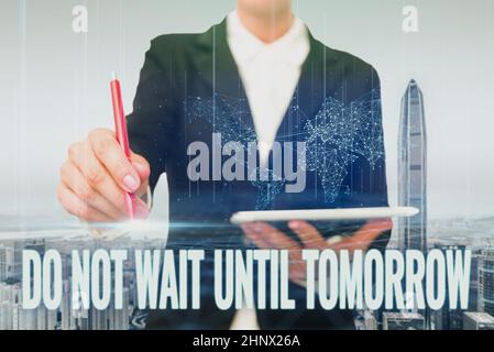 Inspiration showing sign Do Not Wait Until Tomorrow, Business overview needed to do it right away Urgent Better do now Hands Holding A Mobile Phone In Stock Photo