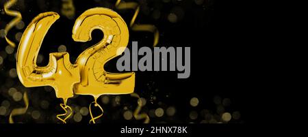 Golden balloons with copy space - Number 42 Stock Photo