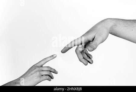 Fingers of Two People Nearly Touching - Isolated Stock Photo