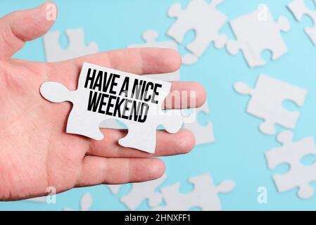 Text showing inspiration Have A Nice Weekend, Business showcase wishing someone that something nice happen holiday Building An Unfinished White Jigsaw Stock Photo