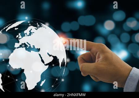 Business man experience virtual world with global network connection and big data technology concept. Stock Photo