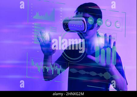 Digital communication and virtual sreen metaverse technology concept WEB 3.0.Man using virtual reality headset virtual reality device. Stock Photo