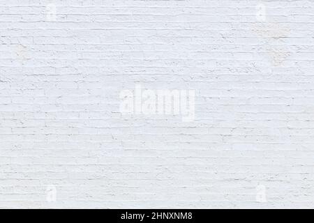 harmonic old brick wall painted in white as background Stock Photo