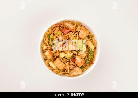 top view of chicken fried rice bowl on white background Stock Photo