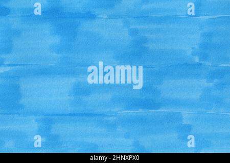 closeup macro of permanent blue marker doodles brushes on white background paper with visible surface fiber structure details Stock Photo