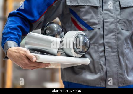 Technician Using Surveillance Security Camera Video System Stock Photo