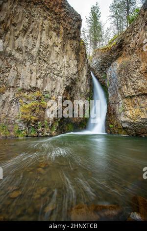 The beautiful Hawk Creek Falls northwest of Davenport Washington near the Spokane river meeting the Columbia River. Stock Photo