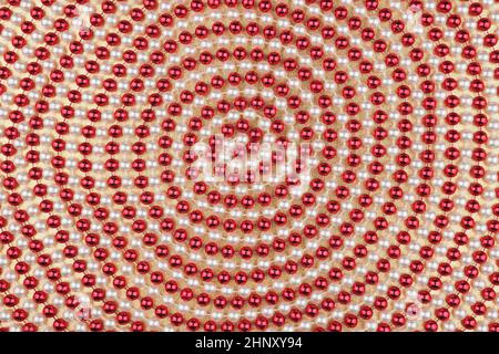 Spiral of red and white beads, can be used as background Stock Photo