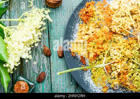 Roasted elderflower in batter with powdered sugar Stock Photo