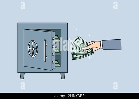 Man put money into vault make investment for future. Male investor save cash in protected strongbox. Saving and banking. Finance stability concept. Cr Stock Photo