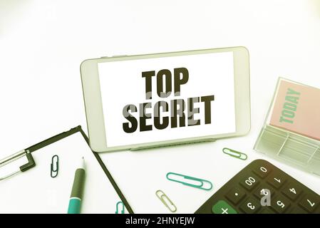 Inspiration showing sign Top Secret, Word for protected by a high degree of secrecy Highly confidential Smartphone With Voice And Video Calls Device F Stock Photo