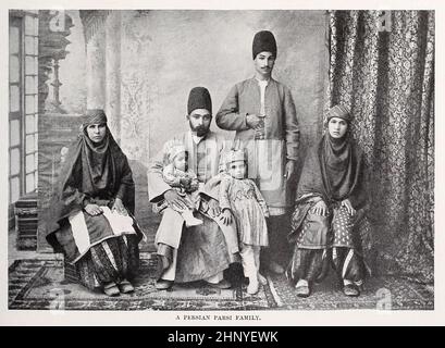 A Persian Parsi family from The living races of mankind : a popular illustrated account of the customs, habits, pursuits, feasts & ceremonies of the races of mankind throughout the world Volume 1 by Sir Harry Hamilton Johnston, Henry Neville Hutchinson, Richard Lydekker and Dr. A. H. Keane published London : Hutchinson & Co. 1902 Stock Photo