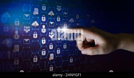 button on virtual screen pressed with finger Global network security world map Key lock security system abstract technology world digital link cyber s Stock Photo