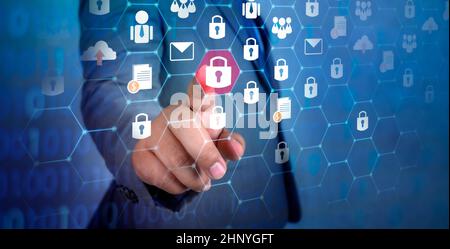 button on virtual screen pressed with finger Global network security world map Key lock security system abstract technology world digital link cyber s Stock Photo
