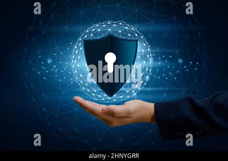 Earth polygon mesh planet World Businessmen shake hands to protect information in cyberspace. Businessman holding shield protect icon protection netwo Stock Photo