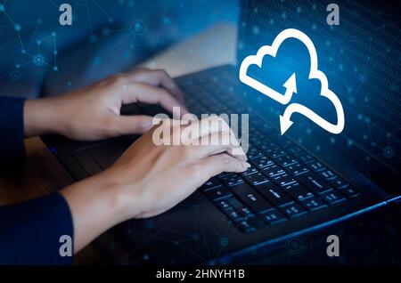 Hand print keyboard Press enter button on the computer hand businessman connect Cloud collect data Cloud computing concept  businessman or information Stock Photo