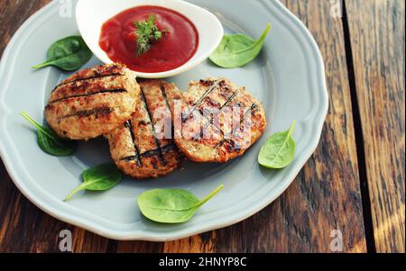 Beef or pork meat barbecue burgers for hamburger prepared grilled on bbq fire flame grill . Stock Photo