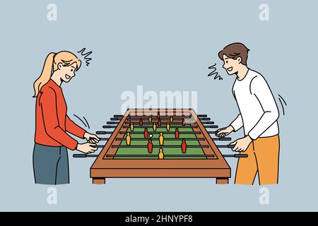 Playing board games and hockey concept. Young excited couple standing playing table air hockey having fun together vector illustration Stock Photo
