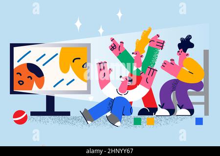 Happy children relax at home have fun watching cartoons on TV together. Smiling little kids rest laugh enjoy childish movie or program on television. Stock Photo