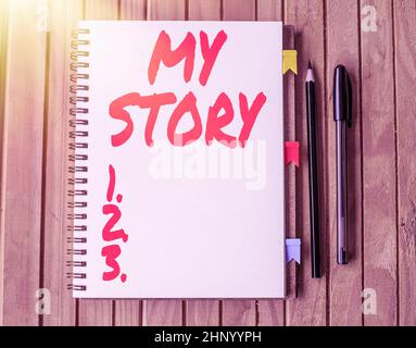 Writing displaying text My Story, Business showcase your past life events actions or choices you made Blank Open Spiral Notebook With Diffrent Pens Pl Stock Photo