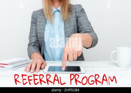 Text sign showing Referral Program, Word Written on internal recruitment method employed by organizations Presenting Business Plan And Designs, Smartp Stock Photo