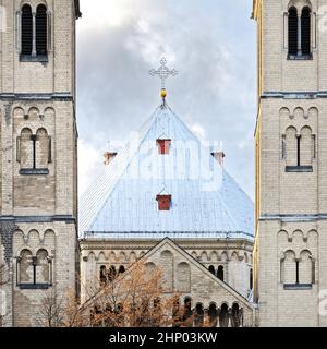 view through the twin towers to the decagon of the romanesque basilica of St. Gereon in cologne Stock Photo