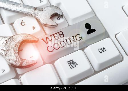 Text showing inspiration Web Coding, Business concept work involved in developing a web site for the Internet Abstract Programmer Typing Antivirus Cod Stock Photo