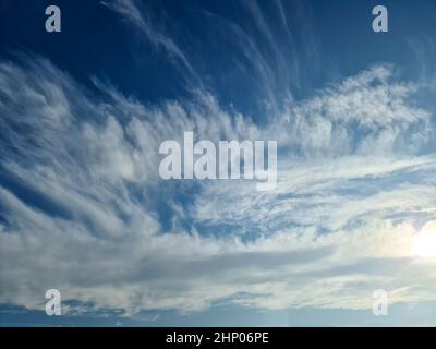 Stunning cirrus cloud formation panorama in a deep blue summer sky seen over Europe Stock Photo