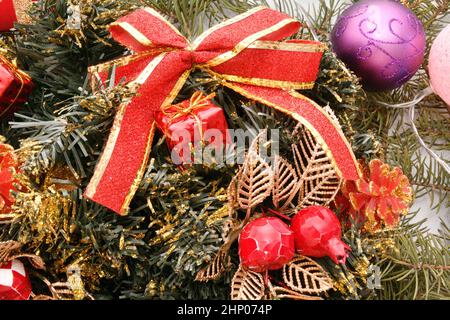 Colorful Christmas garland and decorative decorations for the Christmas tree Stock Photo