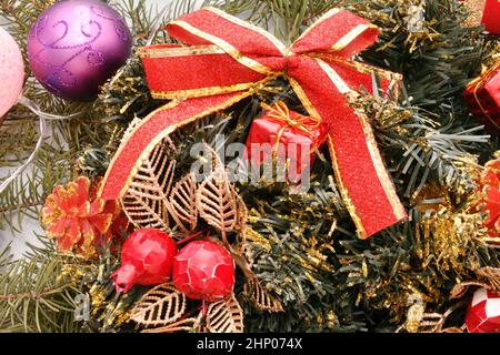 Colorful Christmas garland and decorative decorations for the Christmas tree Stock Photo