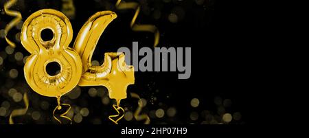 Golden balloons with copy space - Number 84 Stock Photo