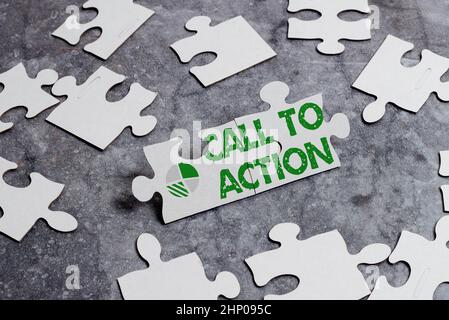 Sign displaying Call To Action, Conceptual photo exhortation do something in order achieve aim with problem Building An Unfinished White Jigsaw Patter Stock Photo