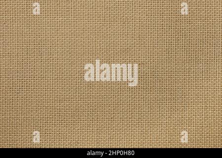 Close up natural beige rough cotton fabric canvas background texture Stock Photo