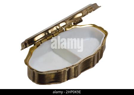 Closeup of a empty opened old gold casket for jewellery bracelets and luxury accessories isolated on a white background. Macro. Stock Photo