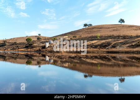 Landscape reflecting in the waters of the Rio Tinto, Huelva, Spain Stock Photo